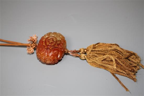 A Chinese reticulated chalcedony pendant and bead necklace, L. 43.5cm